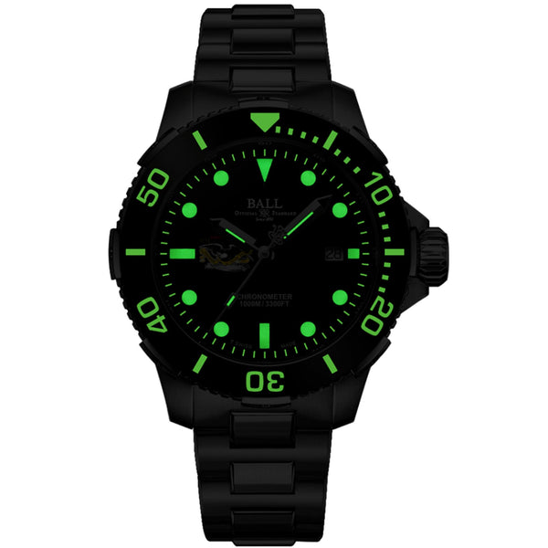 Men's diving watch with green dial, black rubber strap, and black bezel with minute markers
