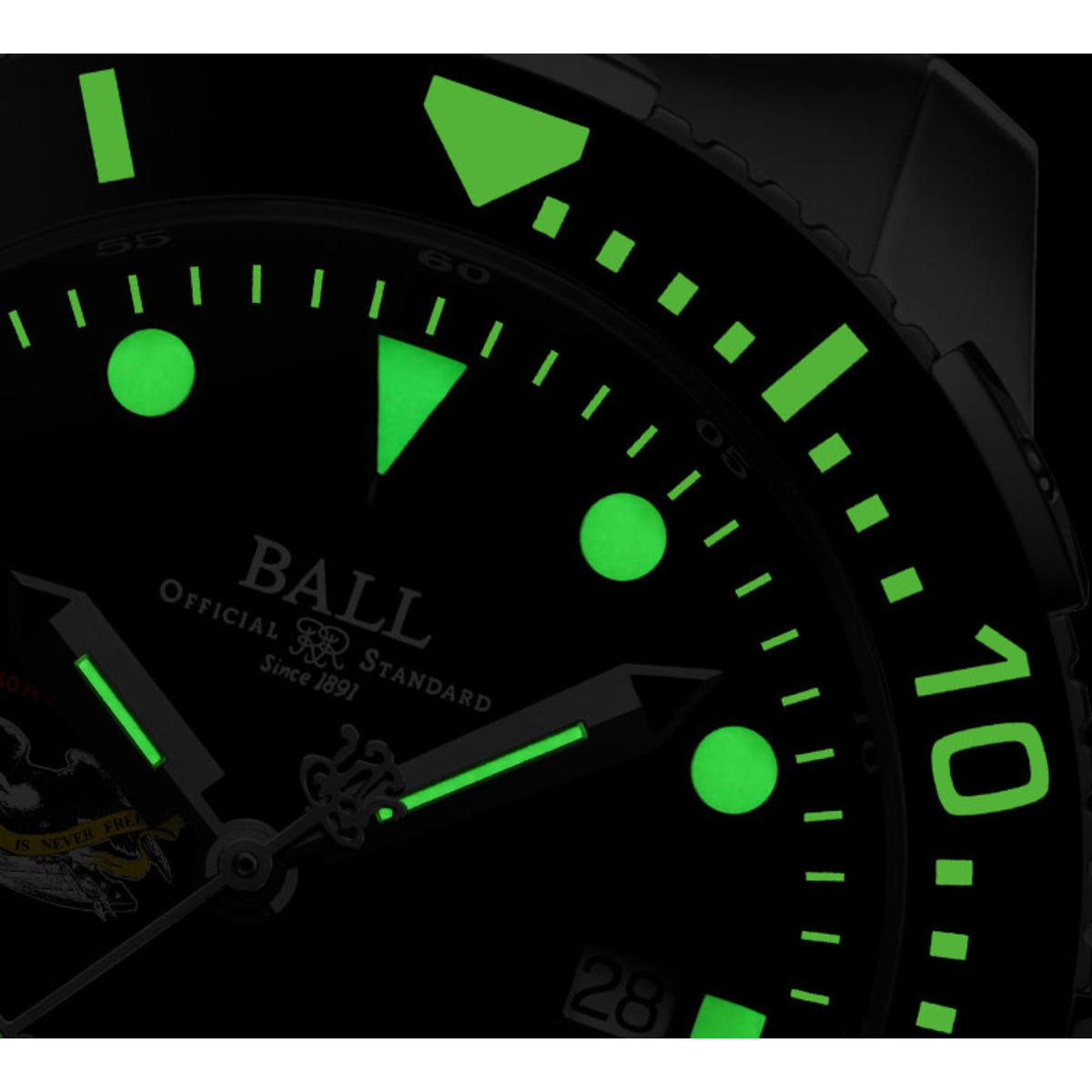 Detailed view of glowing green hour markers and hands on BALL Engineer Hydrocarbon DeepQUEST Protector watch