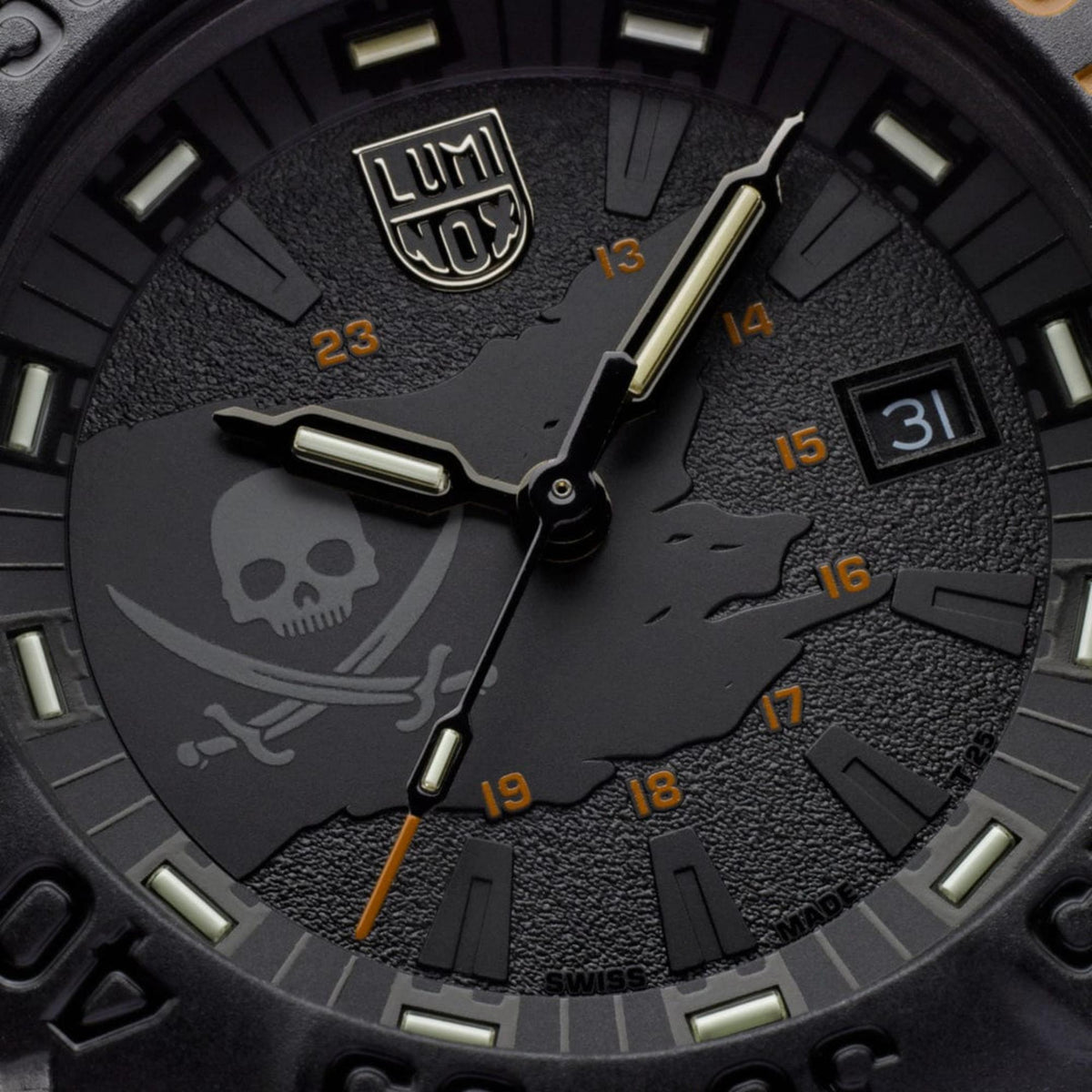 Close-up of black watch dial with skull design, gold hands, and date window