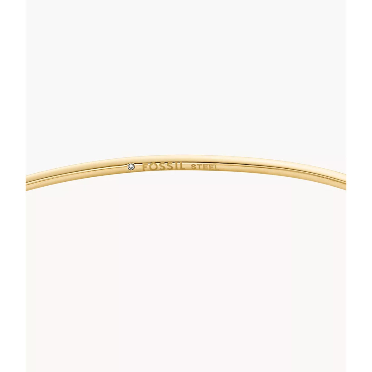 Gold-tone stainless steel cuff bracelet with "FOSSIL STEEL" engraving on inside
