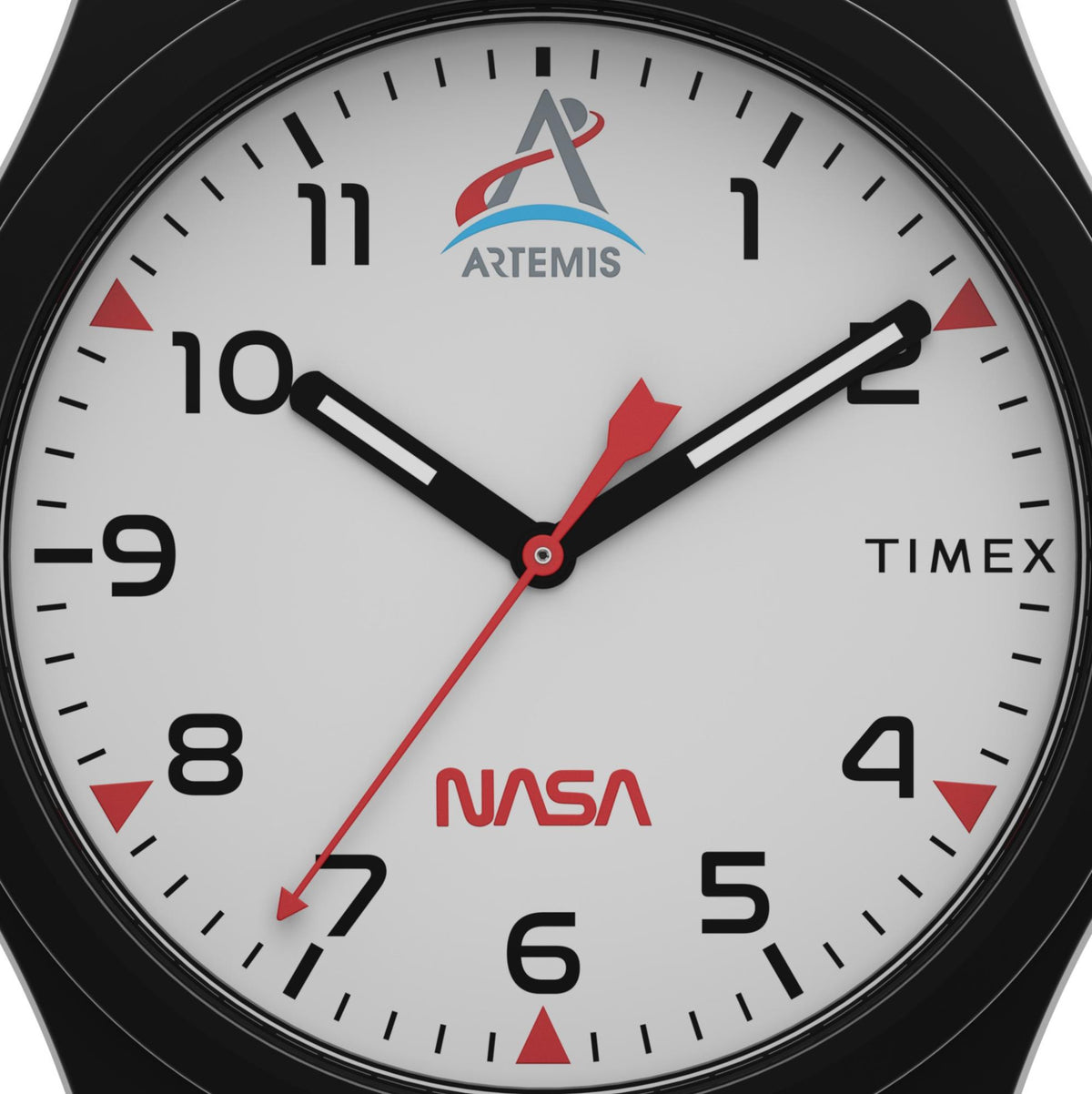White dial quartz watch with black hands, red accents, NASA logo—close-up
