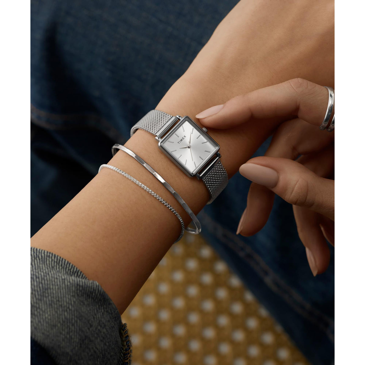 Timex TW2Y26300 worn on a wrist styled with silver bracelets lifestyle view