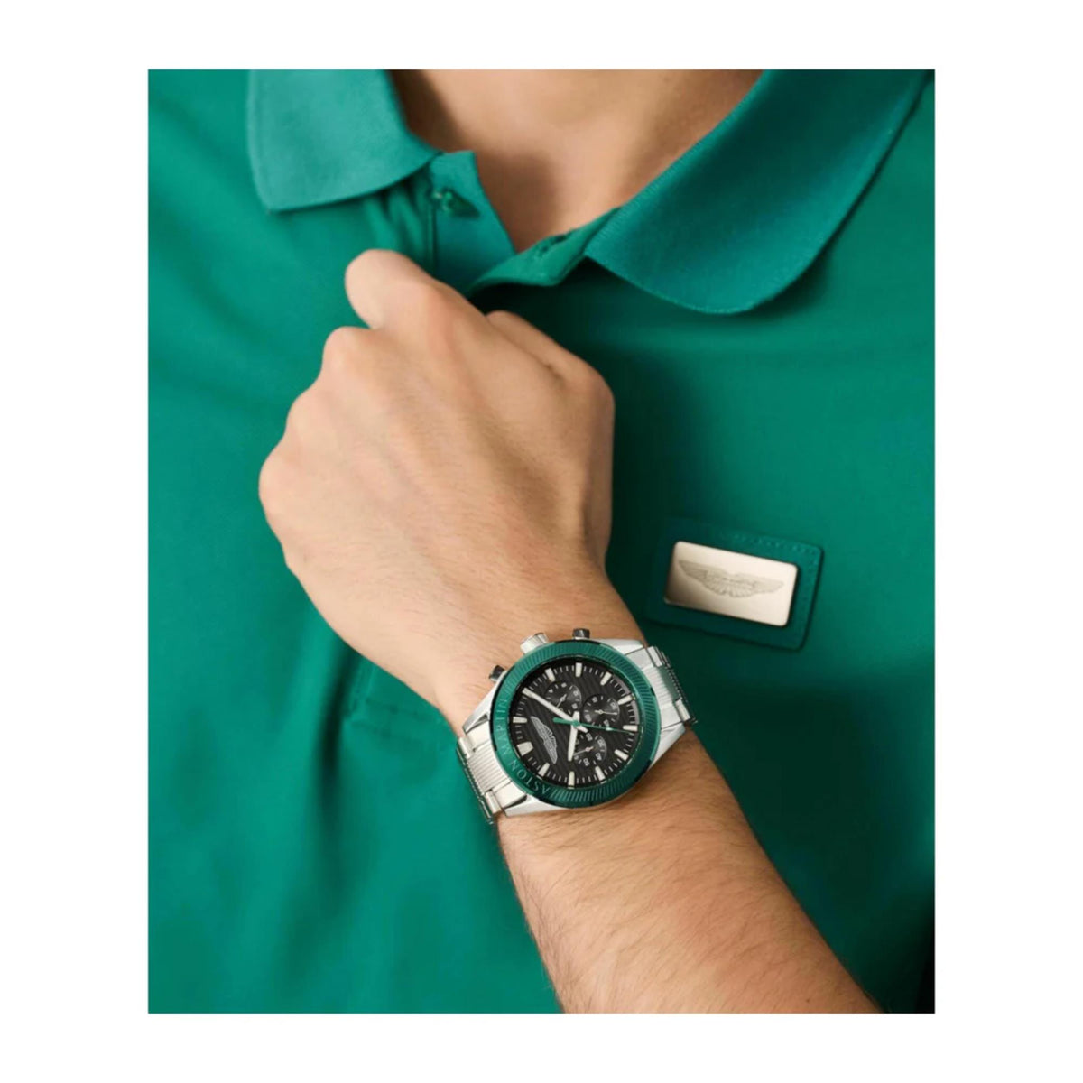 Men’s quartz wristwatch with black dial, silver case, and black silicone strap on arm