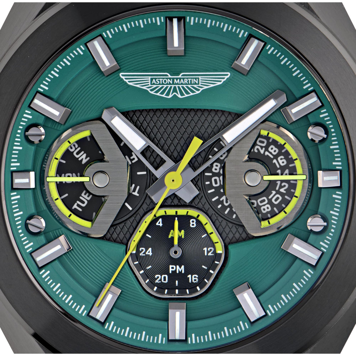 Close-up of green chronograph dial with Aston Martin logo, subdials, and yellow accents.