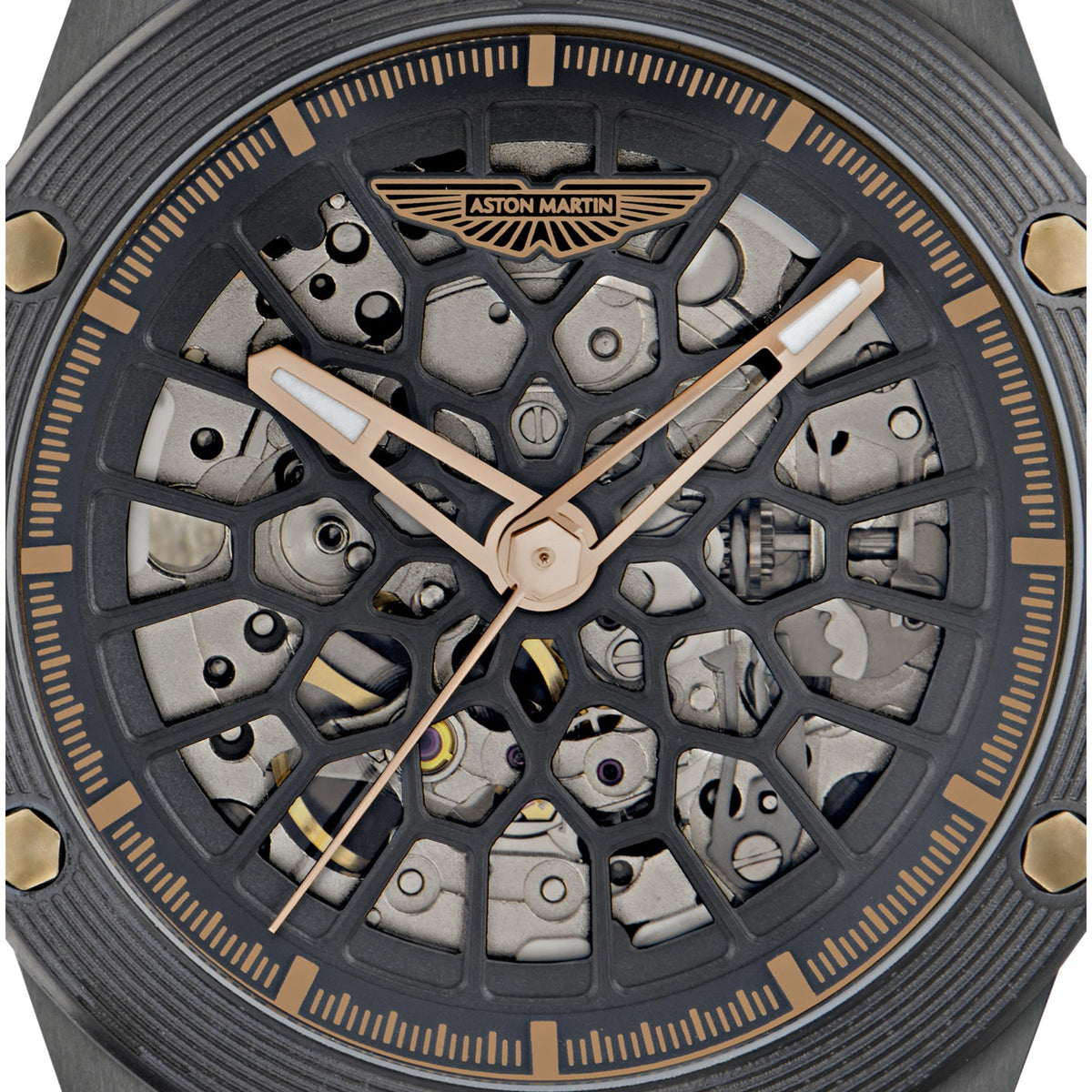 Men's automatic skeleton watch with black dial, gold hands, and Aston Martin logo