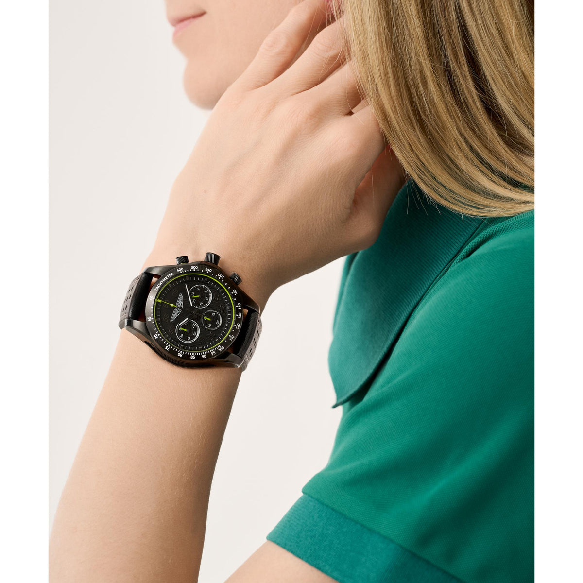Black leather chronograph watch with quartz-style dial and neon-yellow accents