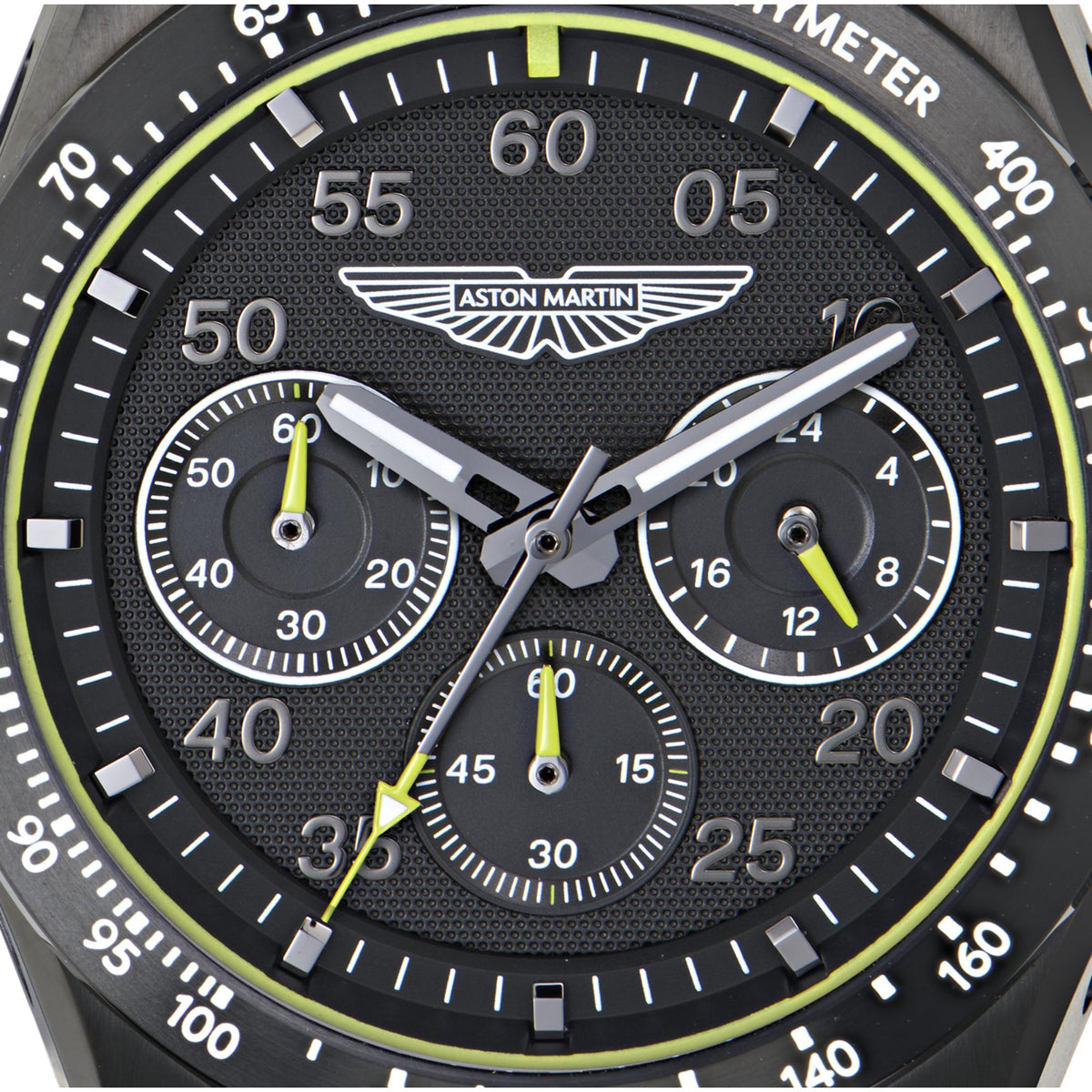 Aston Martin chronograph watch face with black textured dial and neon-yellow details