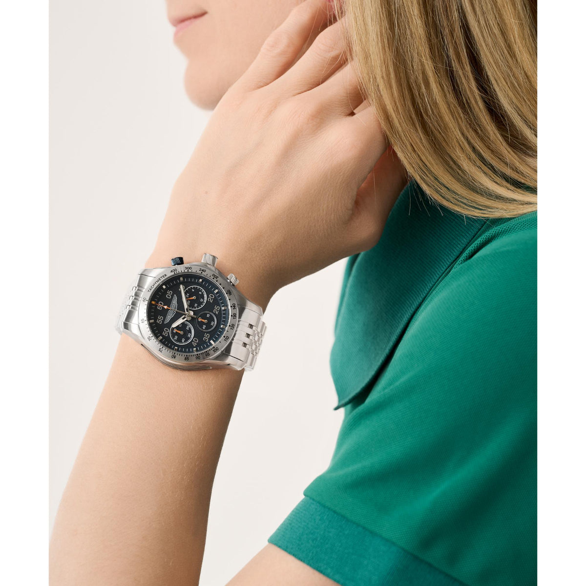 Aston Martin 42mm chronograph quartz watch with blue dial and stainless steel bracelet.