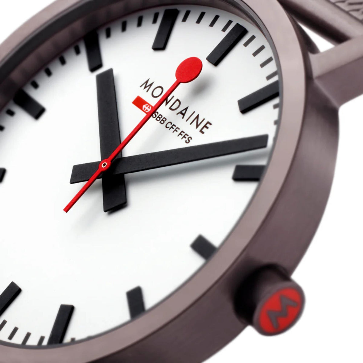 Mondaine Classic A660.30360.1BSBZ casual timepiece close-up highlighting dark IP case and red 'M' crown
