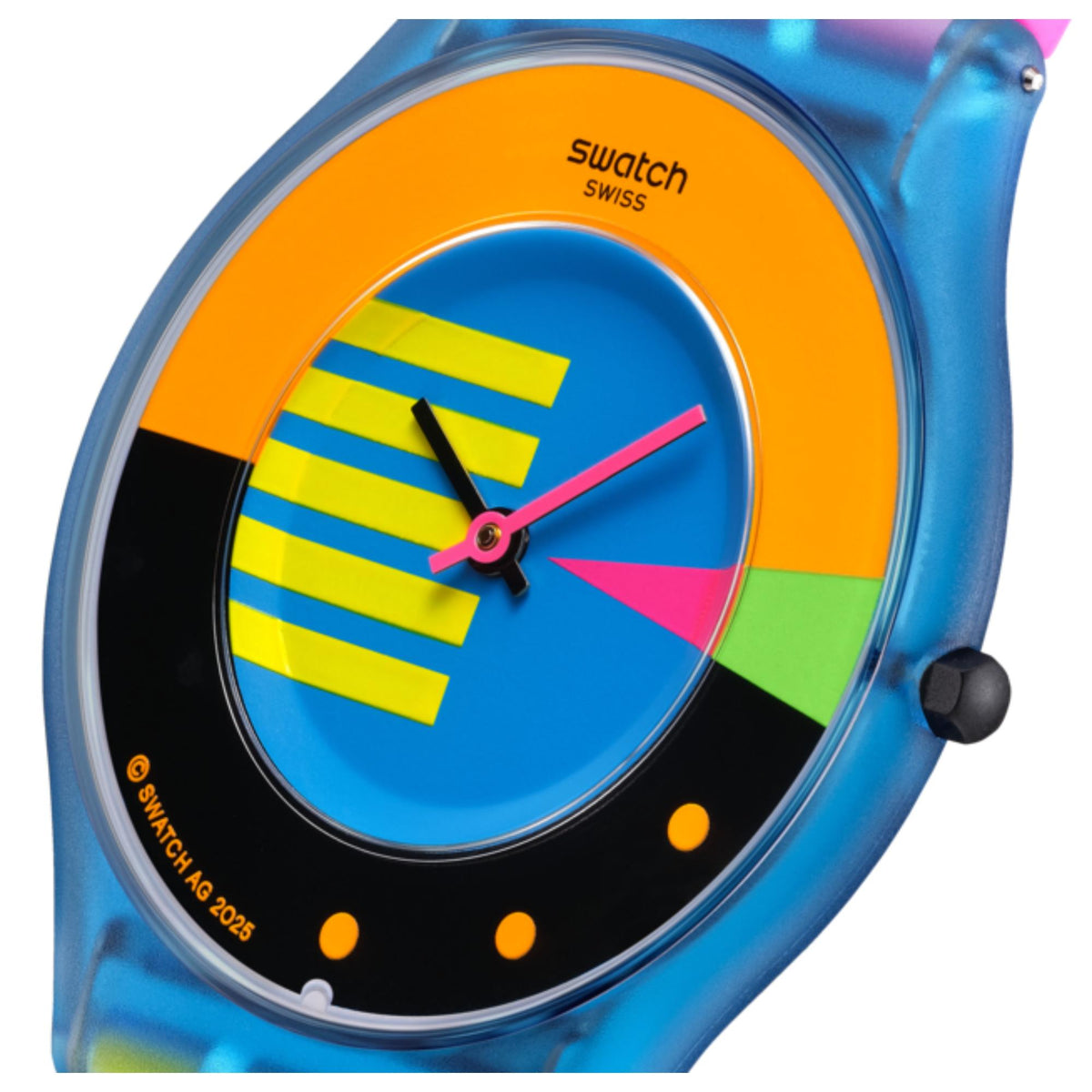 Angled close-up of blue dial watch with colorful ring and pink hour/minute hands