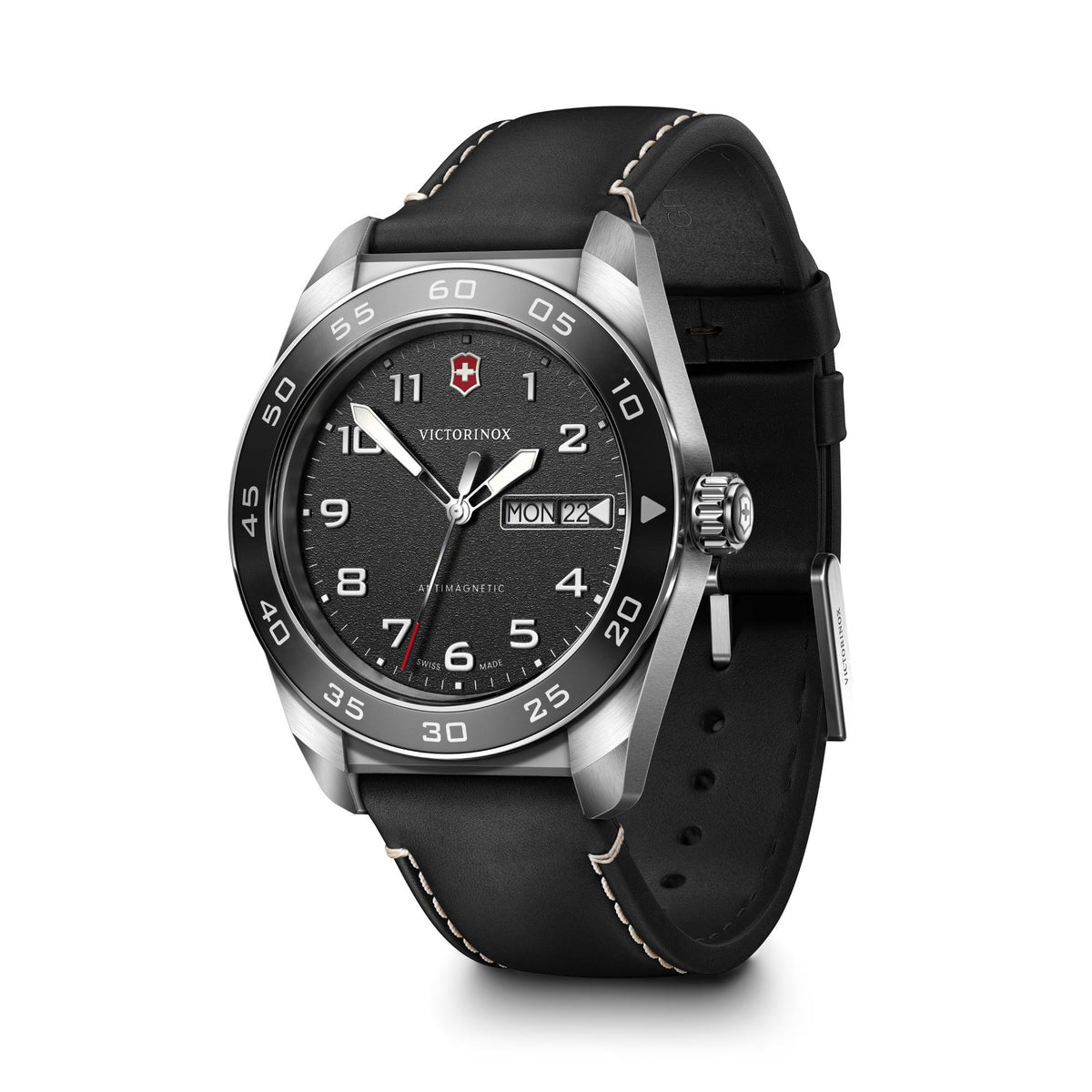 Mens quartz watch with black dial, silver case, and black leather strap