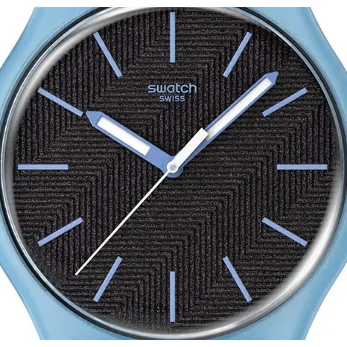 Close-up of Swatch watch dial with black textured face, blue markers and hands