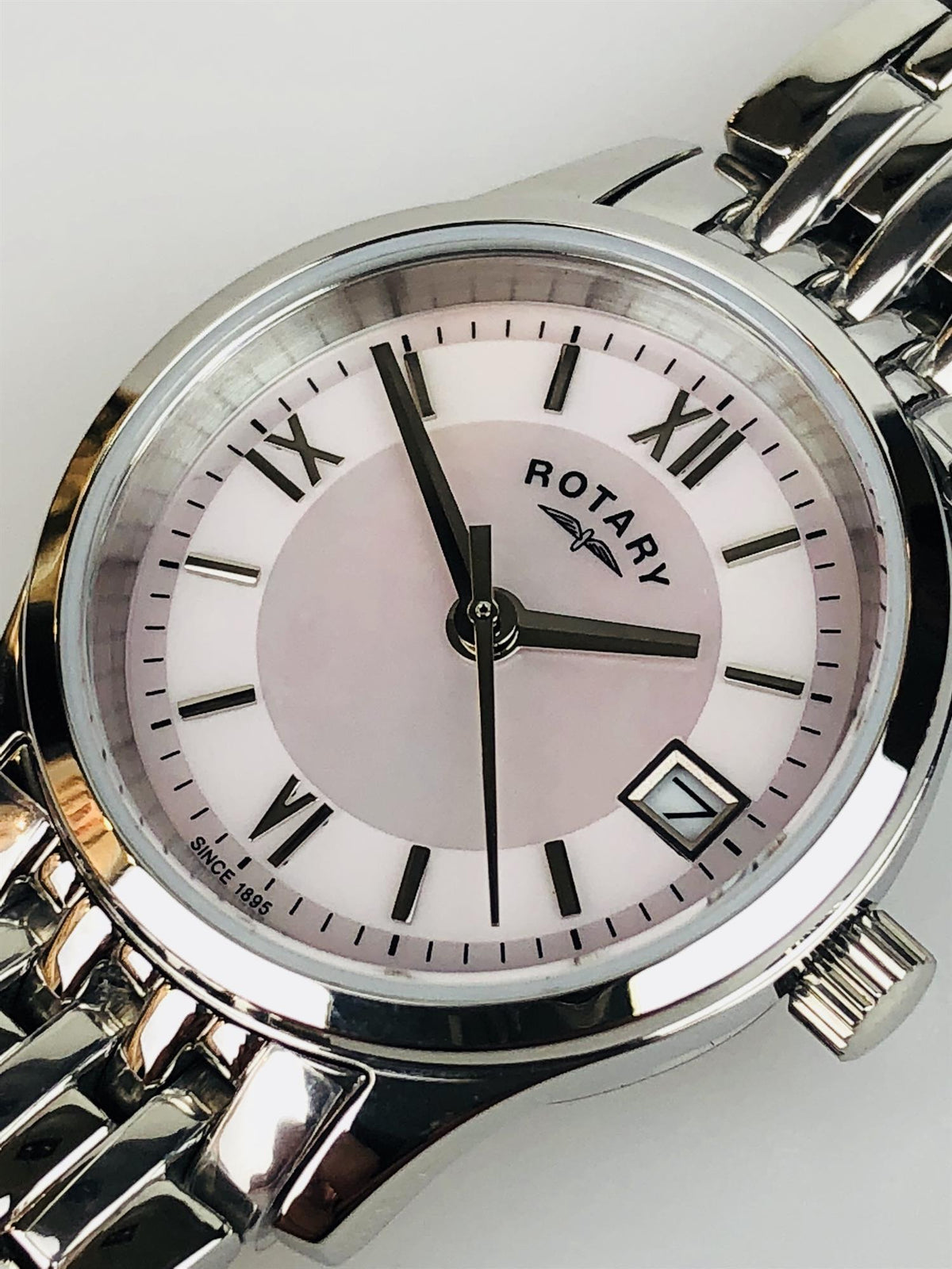 Stainless steel ladies wristwatch with mother-of-pearl dial and black Roman numeral markers