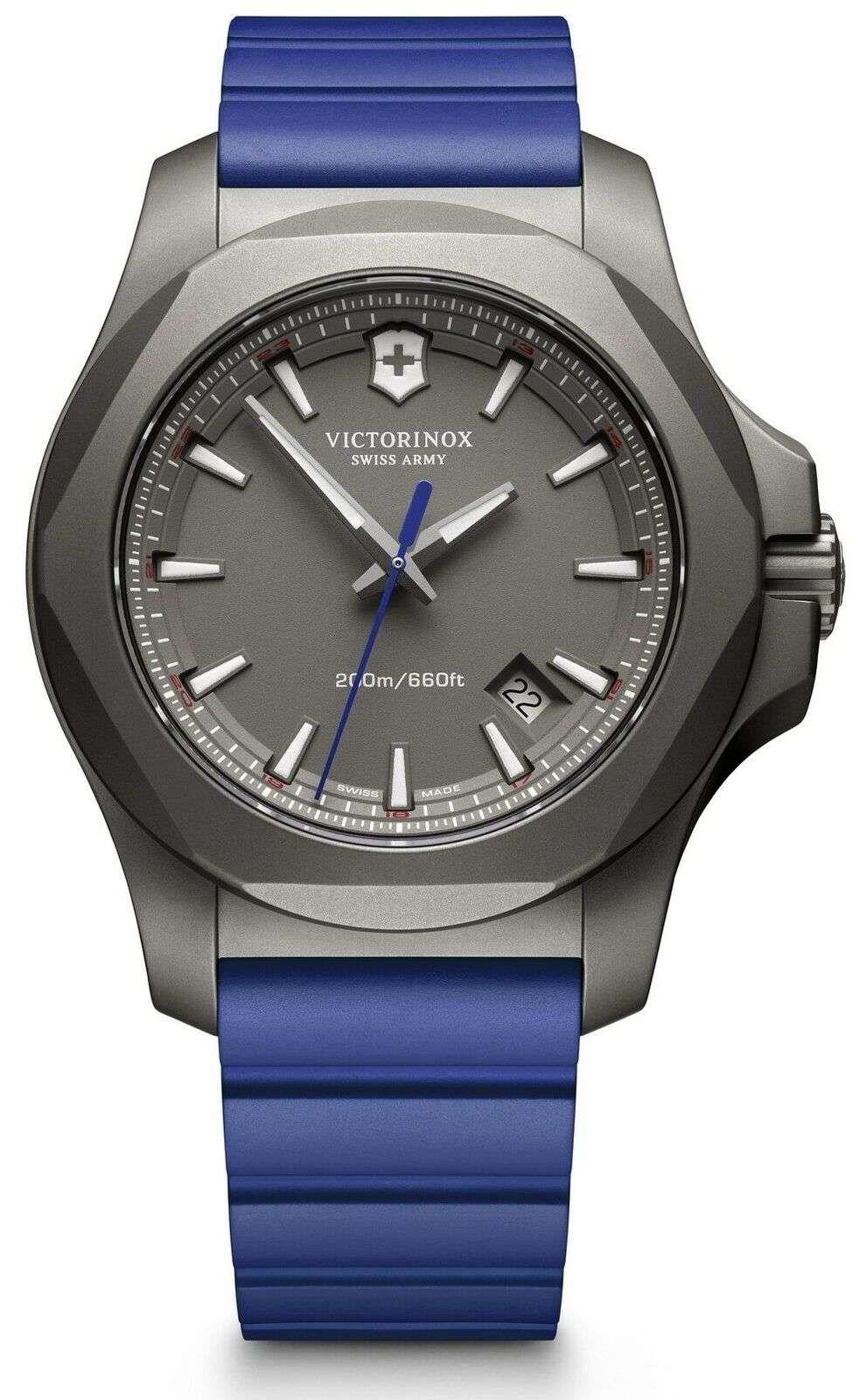 Men's blue rubber watch with grey titanium case and dark dial, three-hand layout and date window