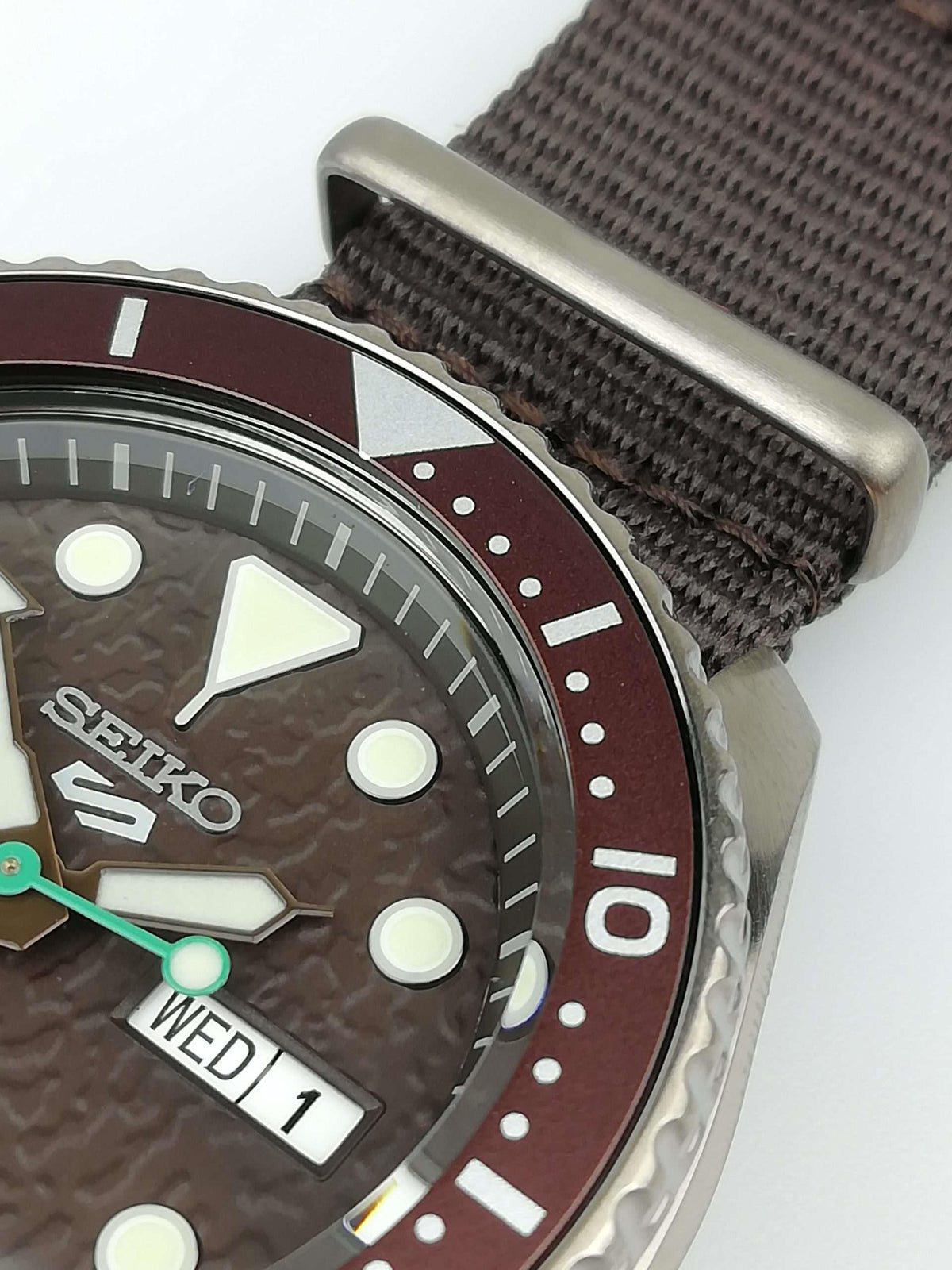 Men's Seiko 5 Sports automatic watch with brown canvas strap and stainless case