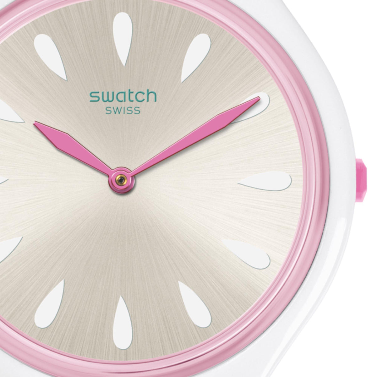 Ladies watch bezel close-up with taupe sunburst dial, pink minute hand, and white markers