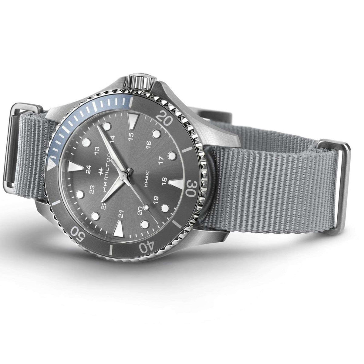 Men's quartz wristwatch on grey NATO strap with grey dial and silver crown at 3 o'clock