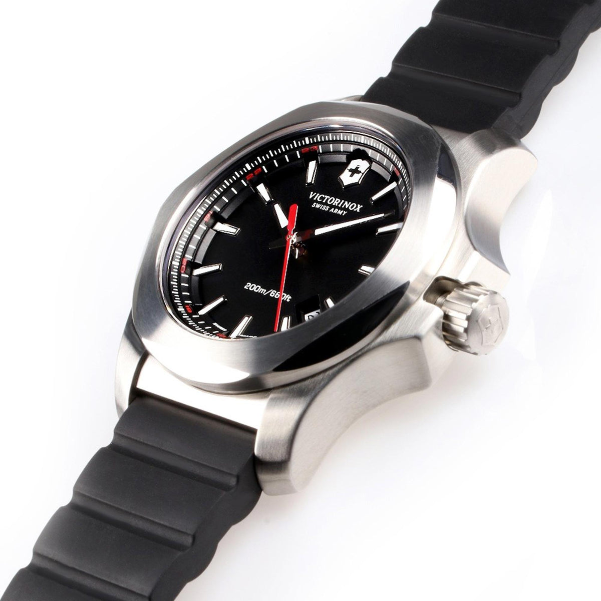 Men's quartz wristwatch showing black dial, red hands, stainless case, black rubber strap