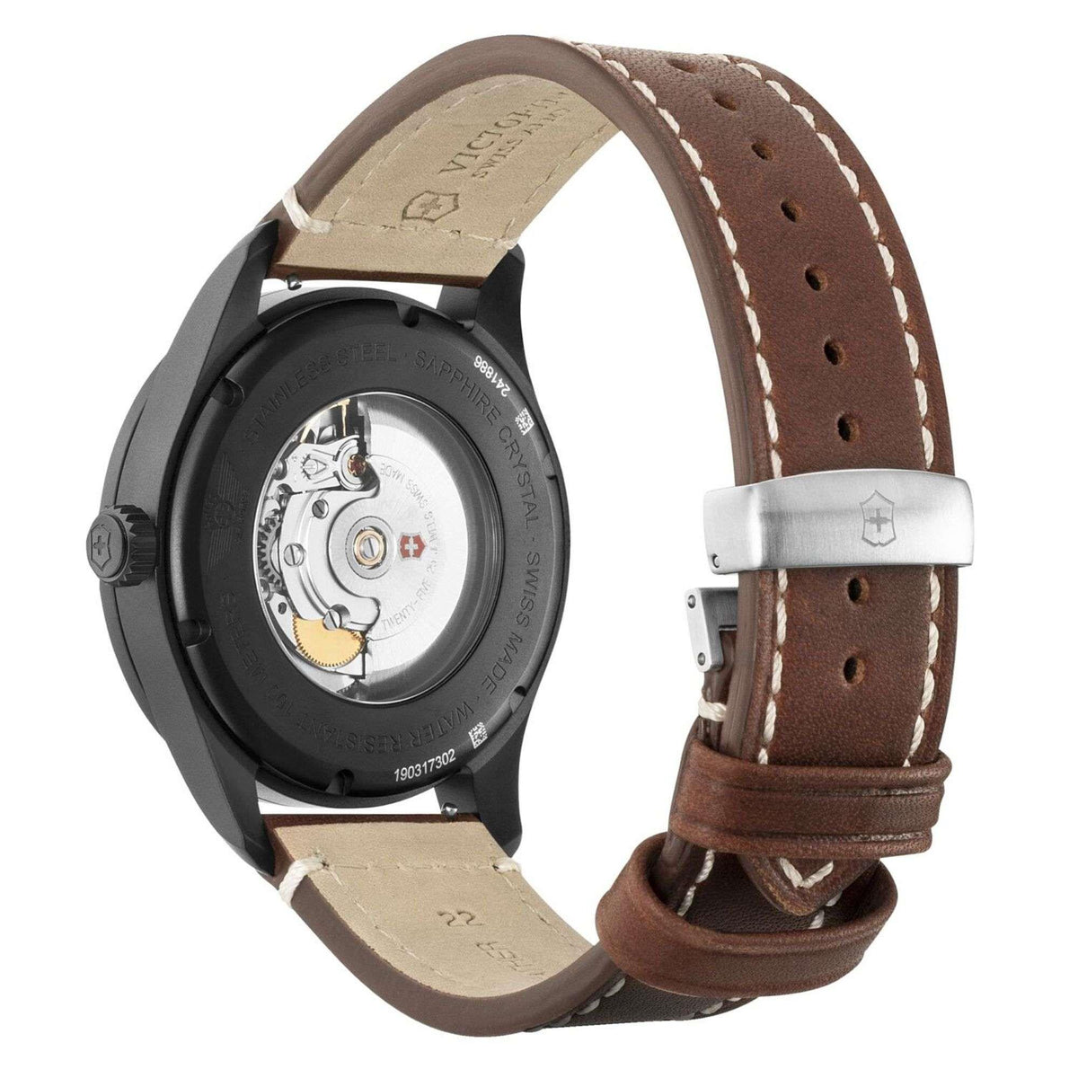 Men's watch underside and strap detail: brown leather band with light buckle tab.