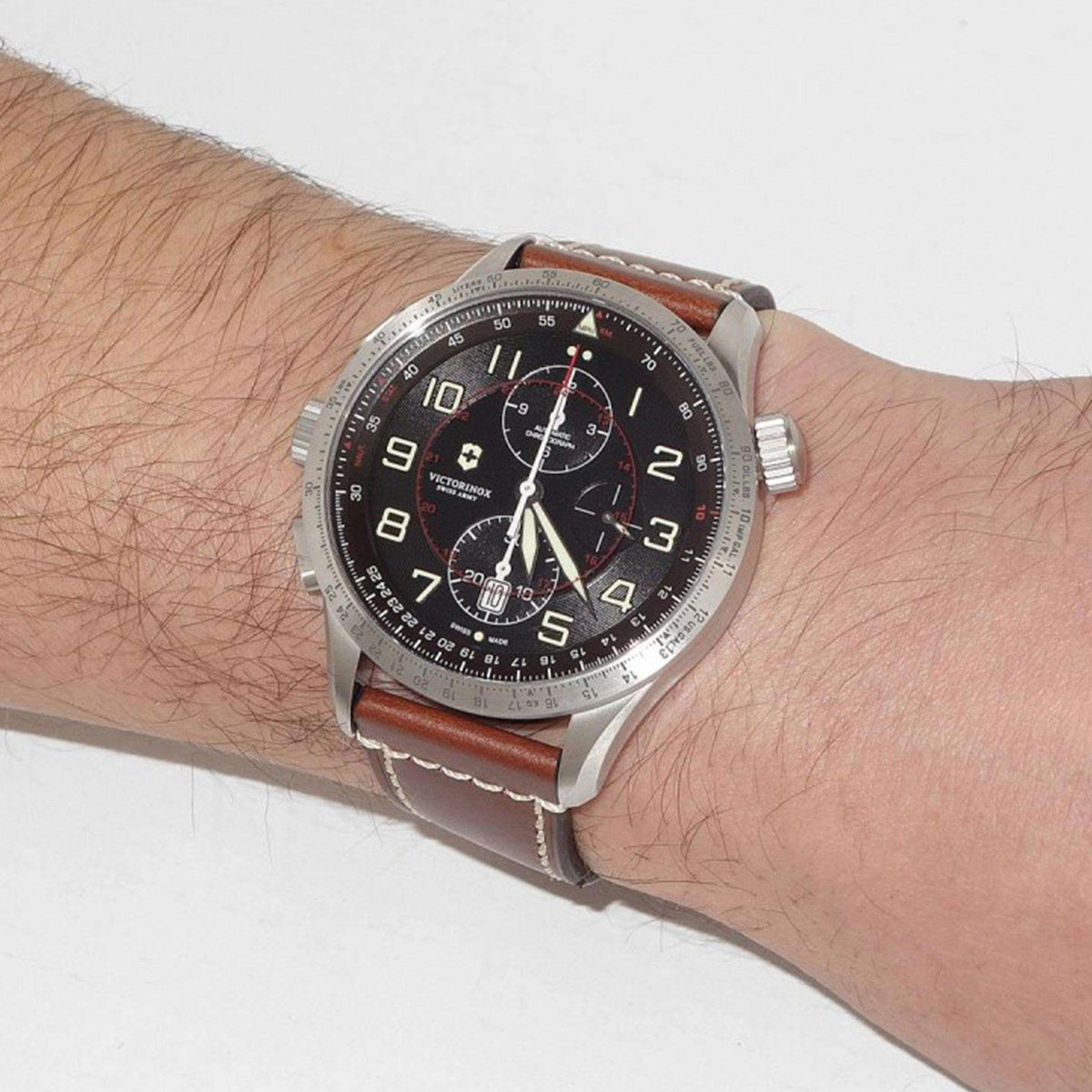 Men's automatic wristwatch with grey dial, brown leather strap, silver crown
