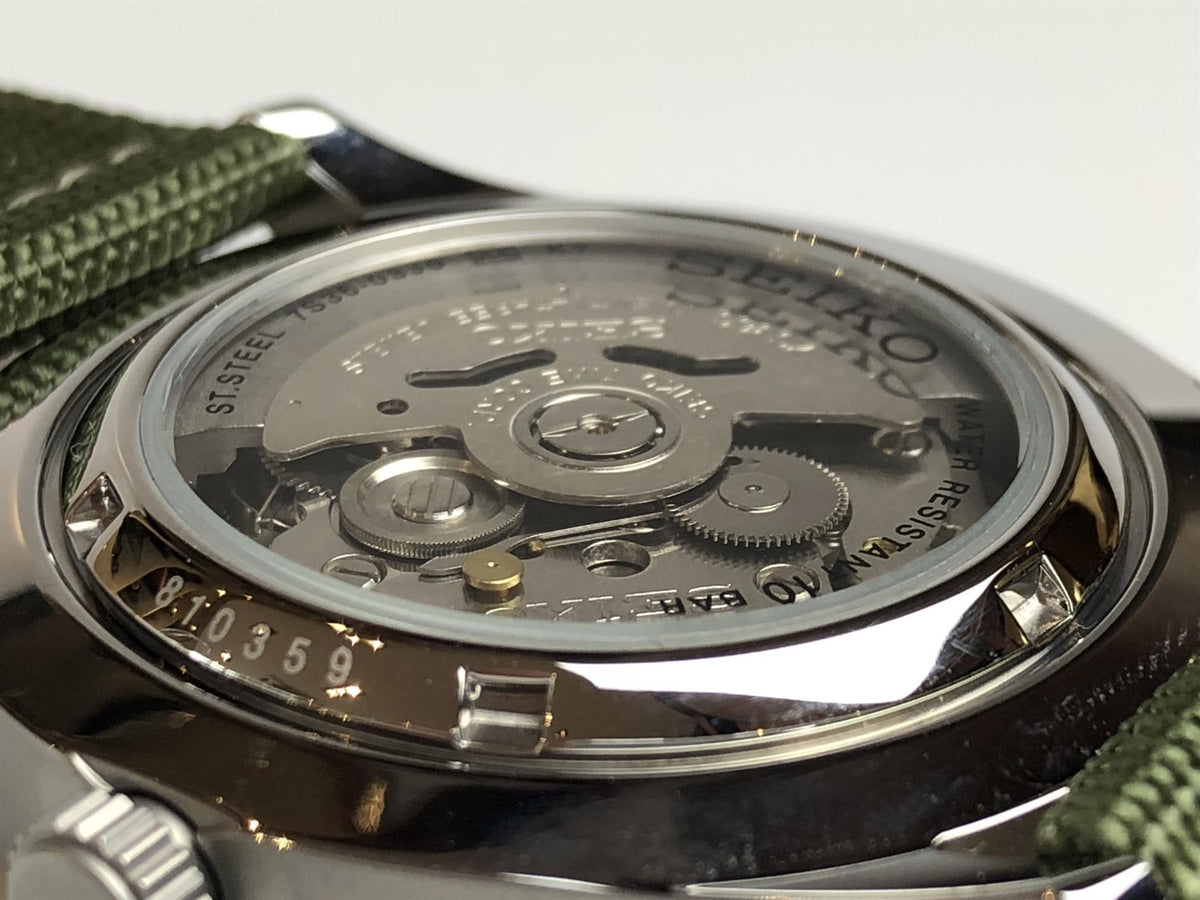 Seiko 5 Sports men's automatic watch, see-through case back with movement, green strap