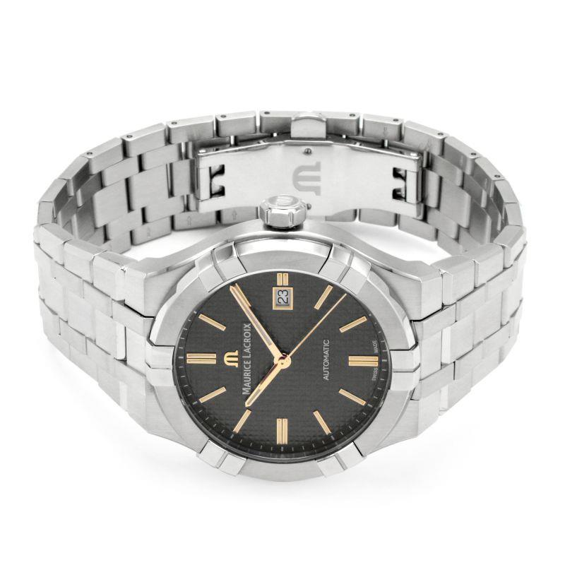 Men's stainless-steel automatic wristwatch with black dial and silver baton markers, link bracelet