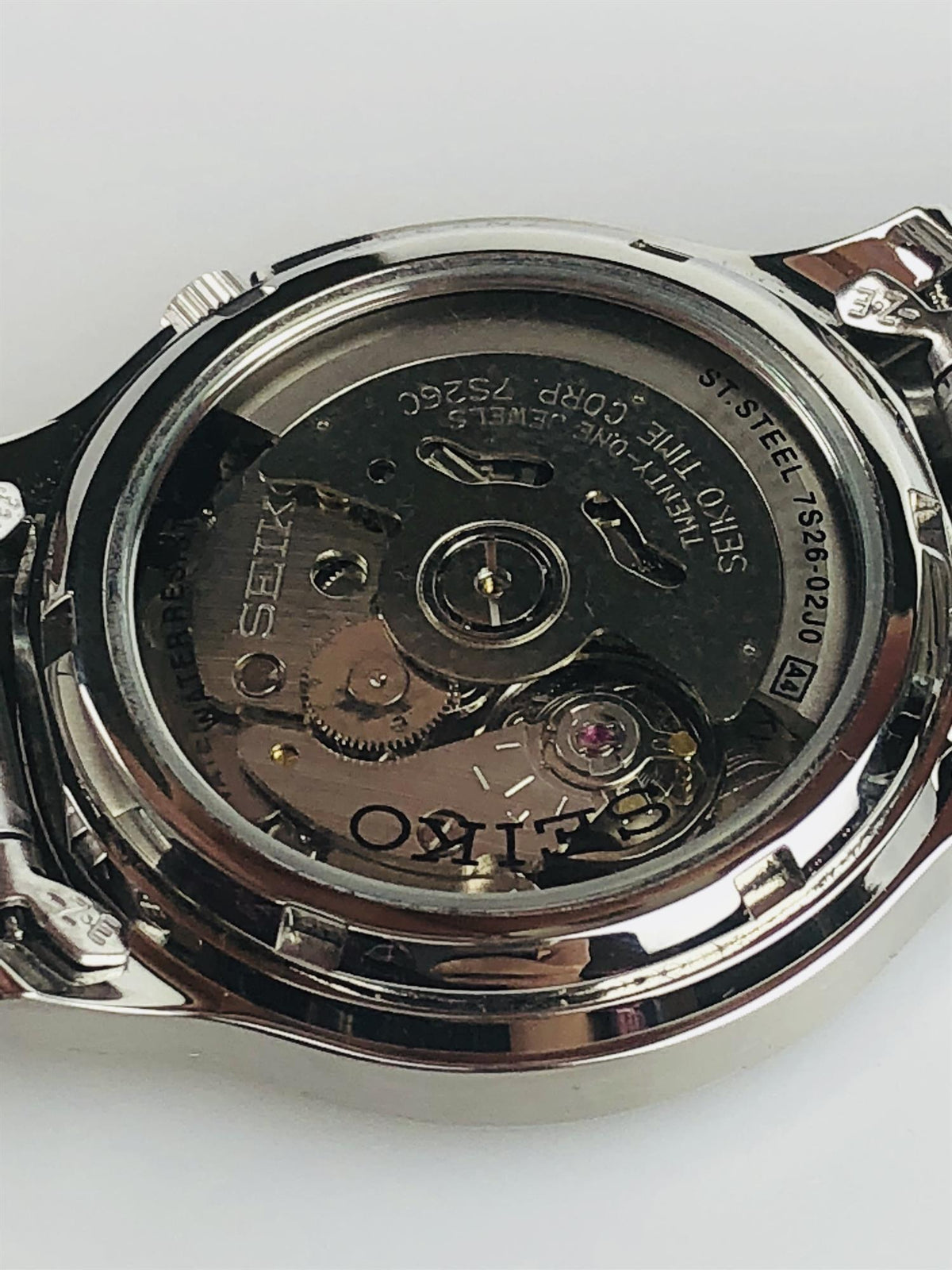 Seiko automatic watch rear view with engraved case back and visible mechanical movement
