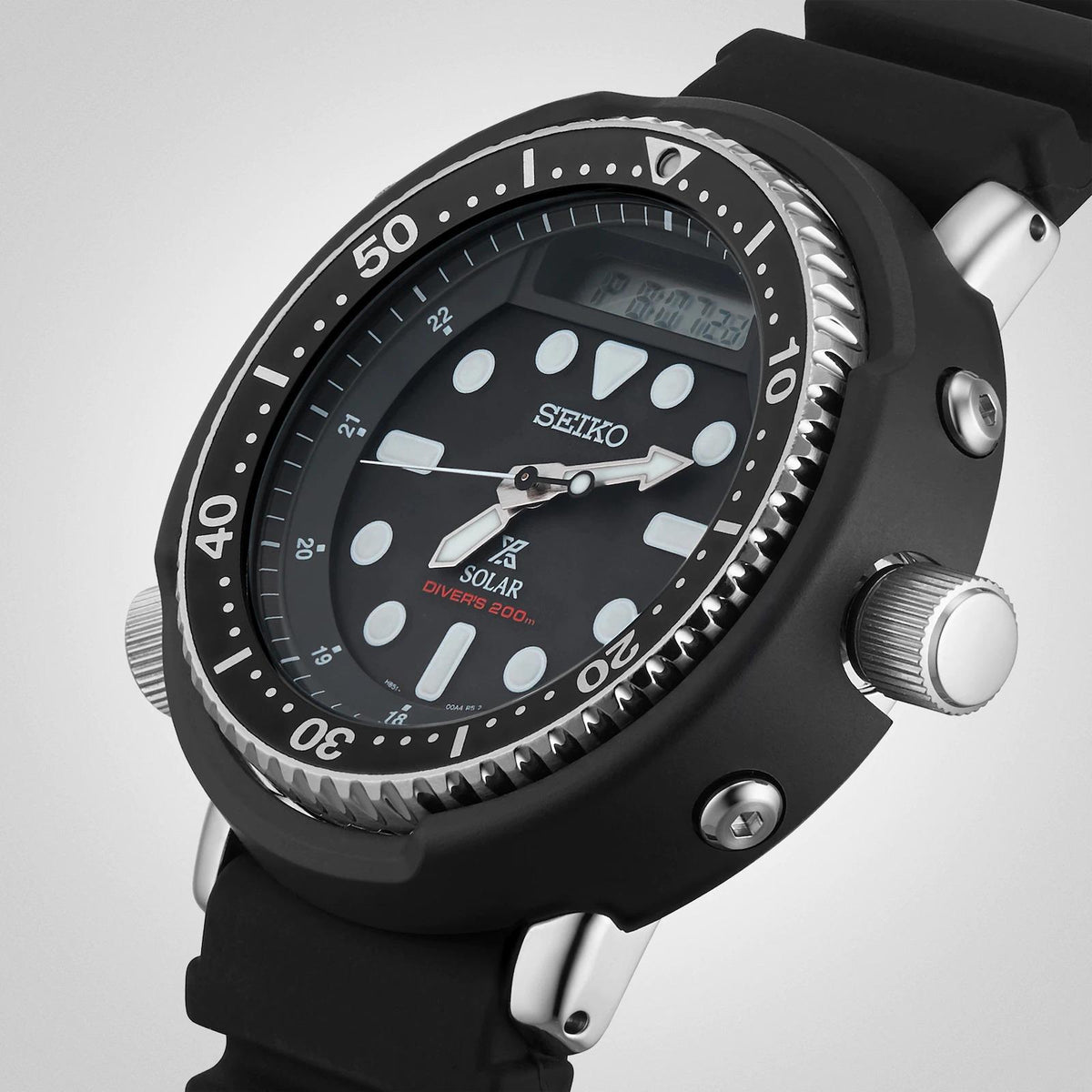 Seiko Prospex dive watch angled view with black bezel, black dial, and side crowns