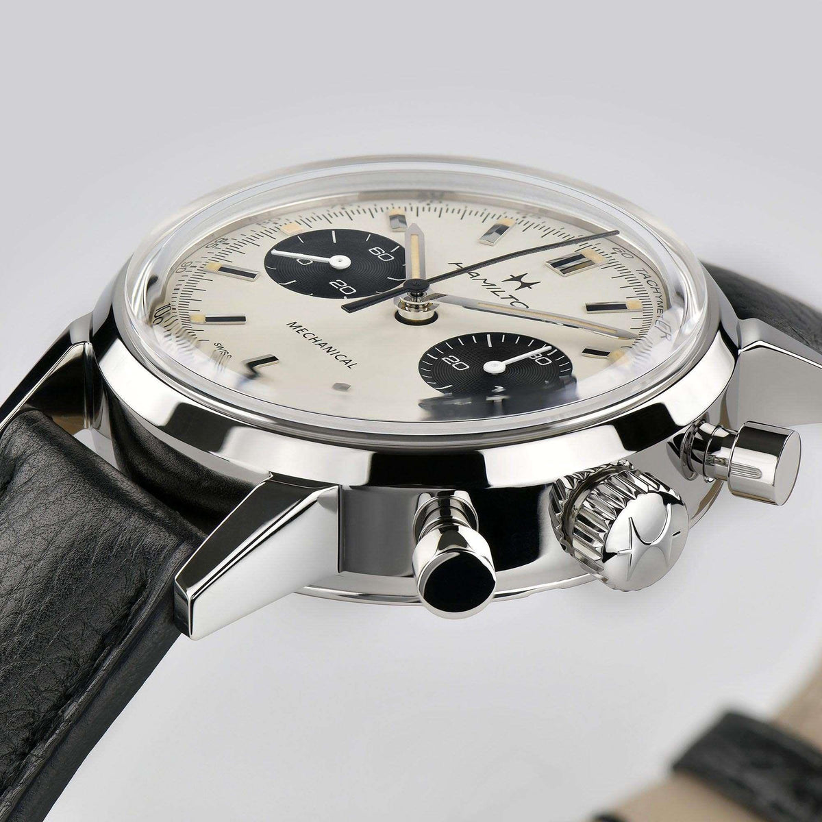 Hamilton chronograph watch with white dial, black leather strap, steel pushers and crown