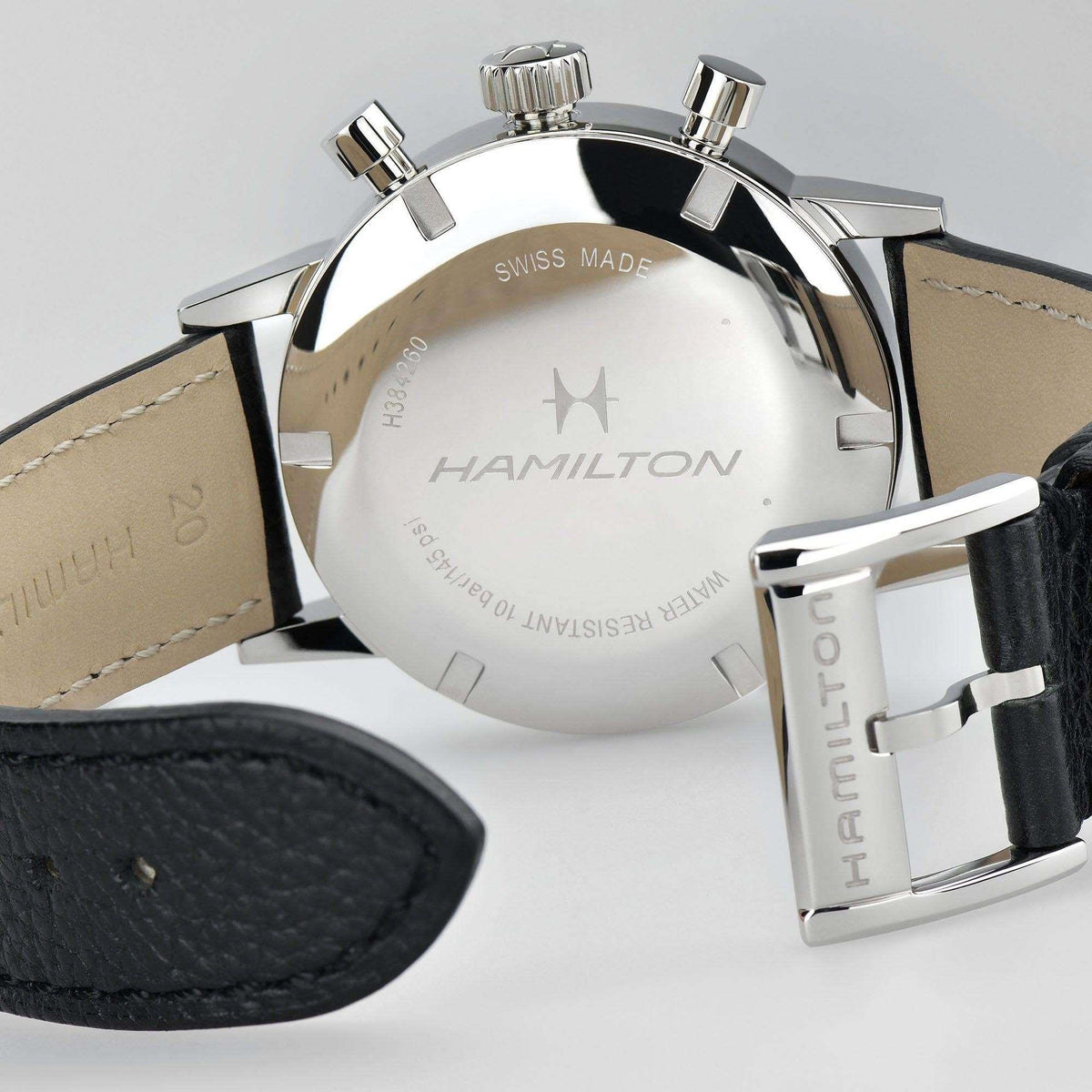 Hamilton chronograph watch case back and buckle, black leather strap, stainless steel