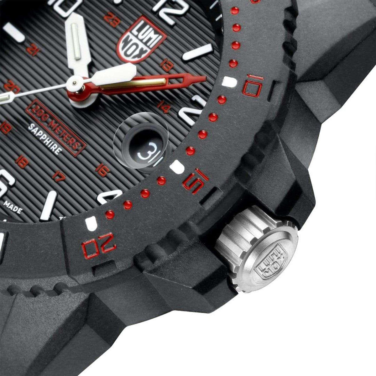 Men's black dive watch with textured case, crown, and black rubber strap