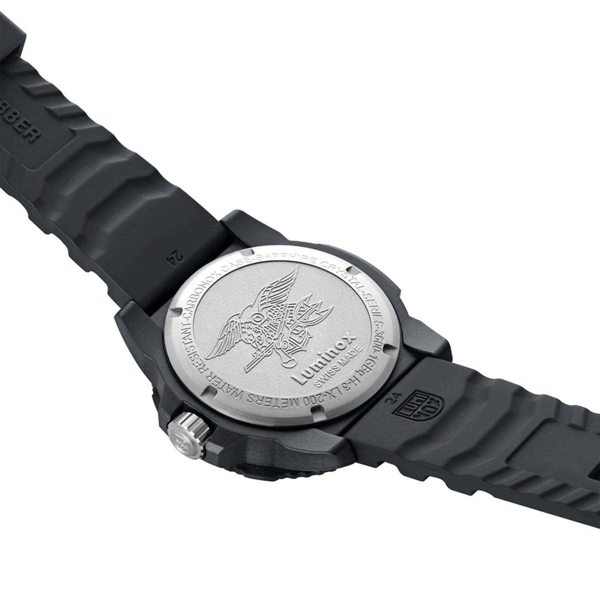 Men's watch caseback with engraved emblem on black rubber strap