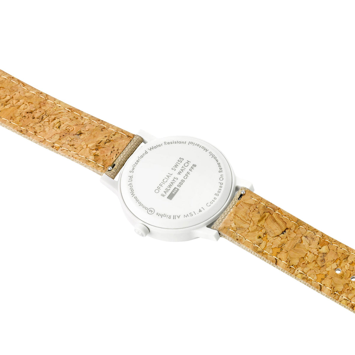 Mondaine Essence quartz watch caseback detail with tan leather strap