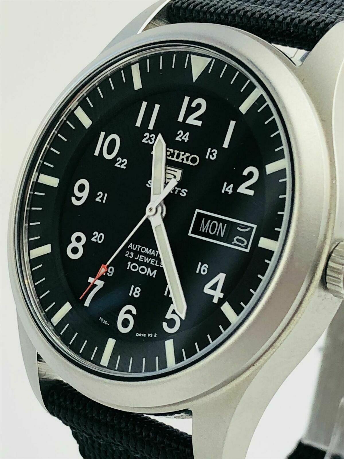 Seiko 5 Sports men's watch angled view with black dial and black NATO canvas strap