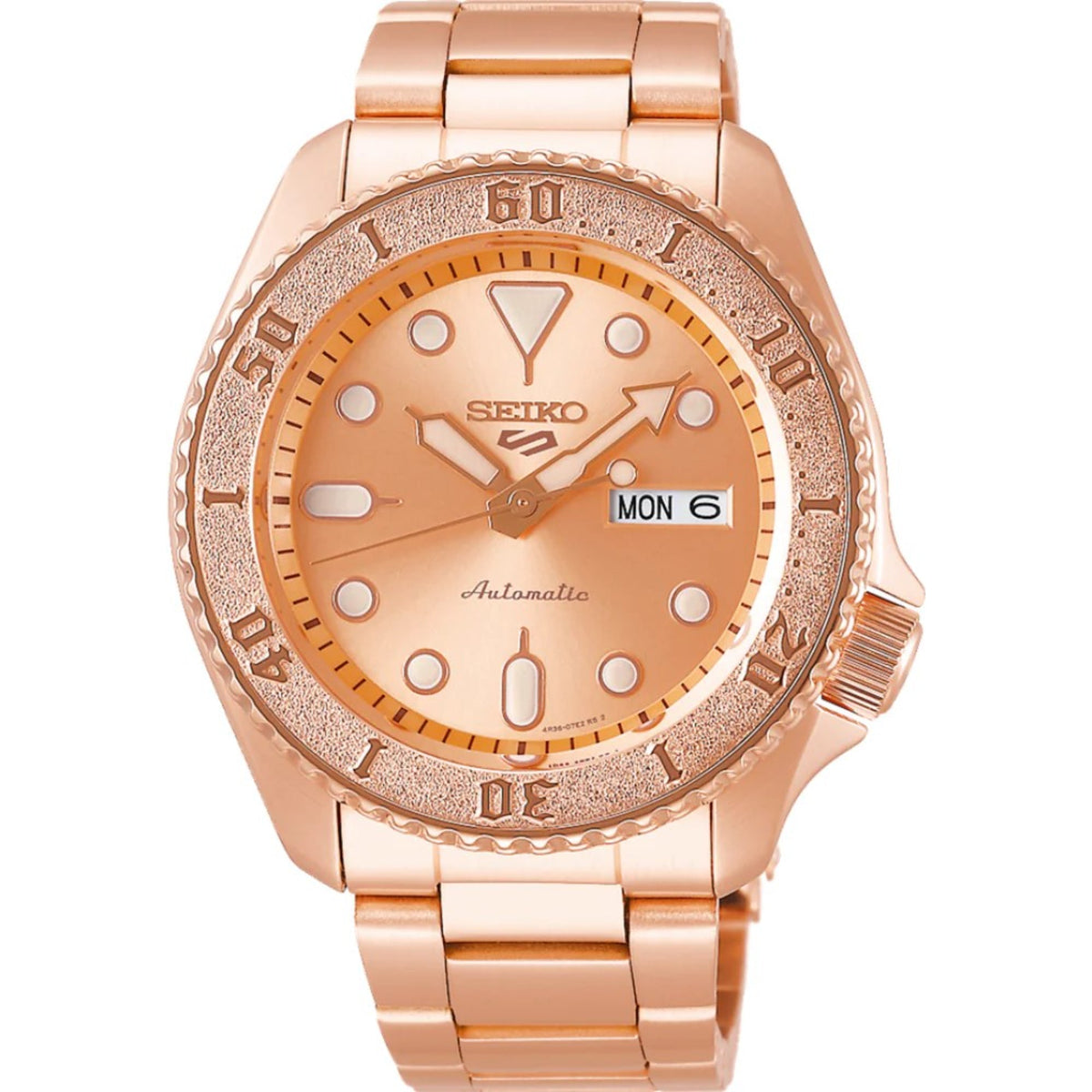 Men's rose gold automatic watch with peach dial, textured bezel, and hour markers