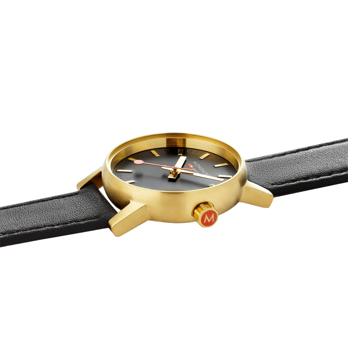 Gold-tone round watch case on black leather strap, angled side view