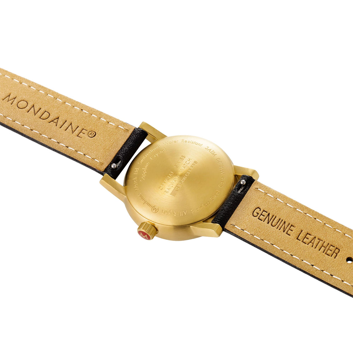 Leather strap end with “Genuine Leather” wording and gold-tone caseback details