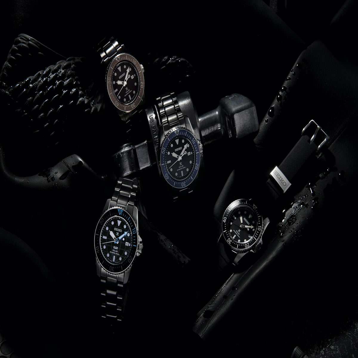 Set of solar dive watches with black dials and stainless bracelets