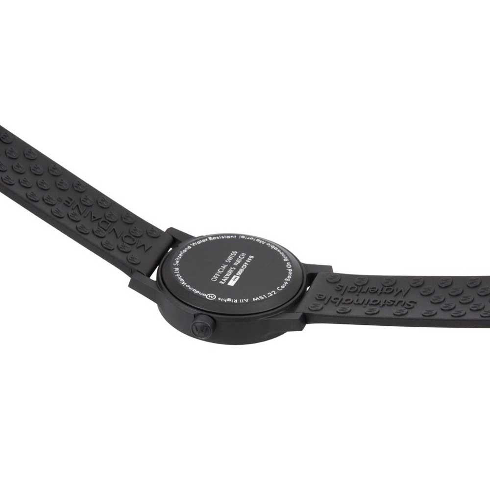 Black watch caseback detail with textured bracelet-style strap and crown-side view.