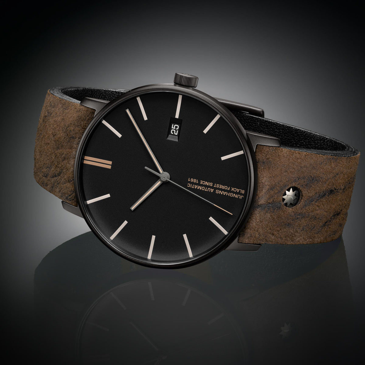 Automatic men's watch with black dial and brown leather strap, close side view of crown and lugs