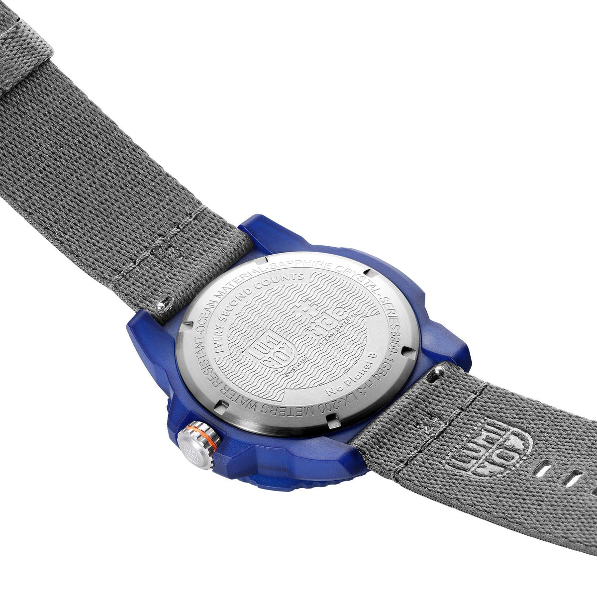 Luminox watch case back with textured engraving on grey nylon strap