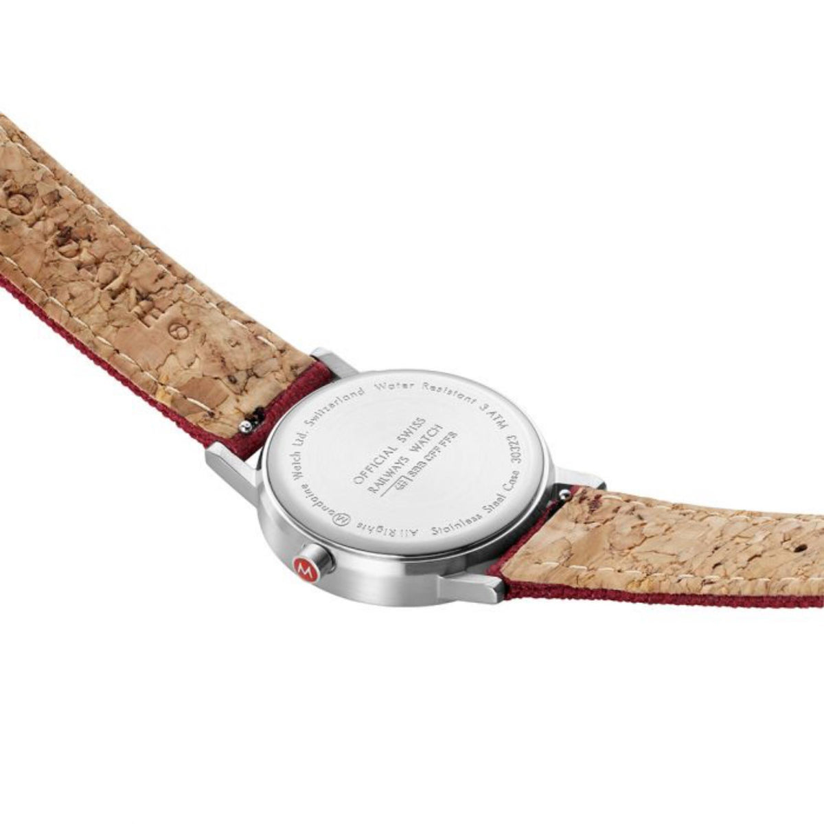 Ladies wrist watch with tan textile strap underside and round silver case back