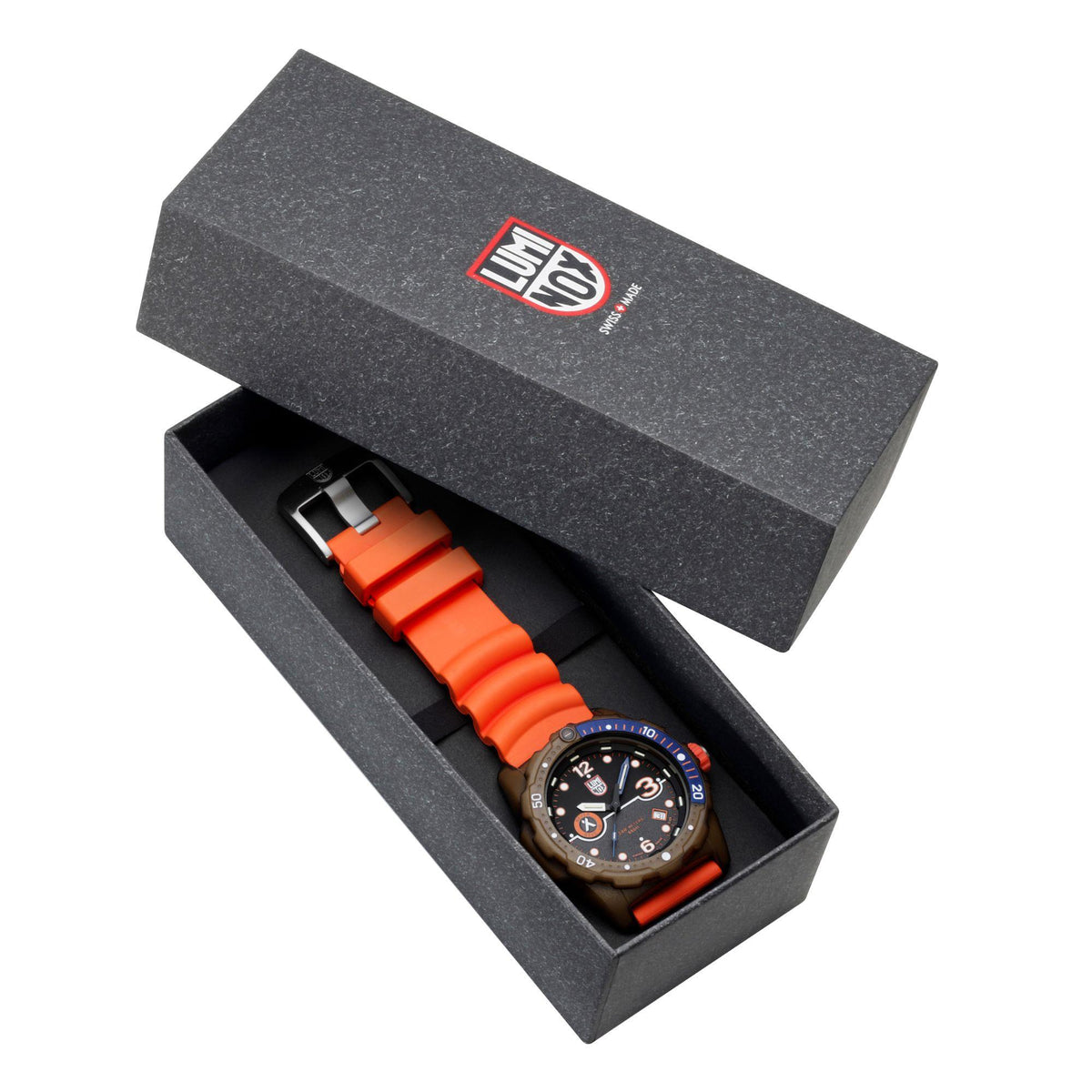 Men's quartz wristwatch in open box with orange rubber strap and dark dial