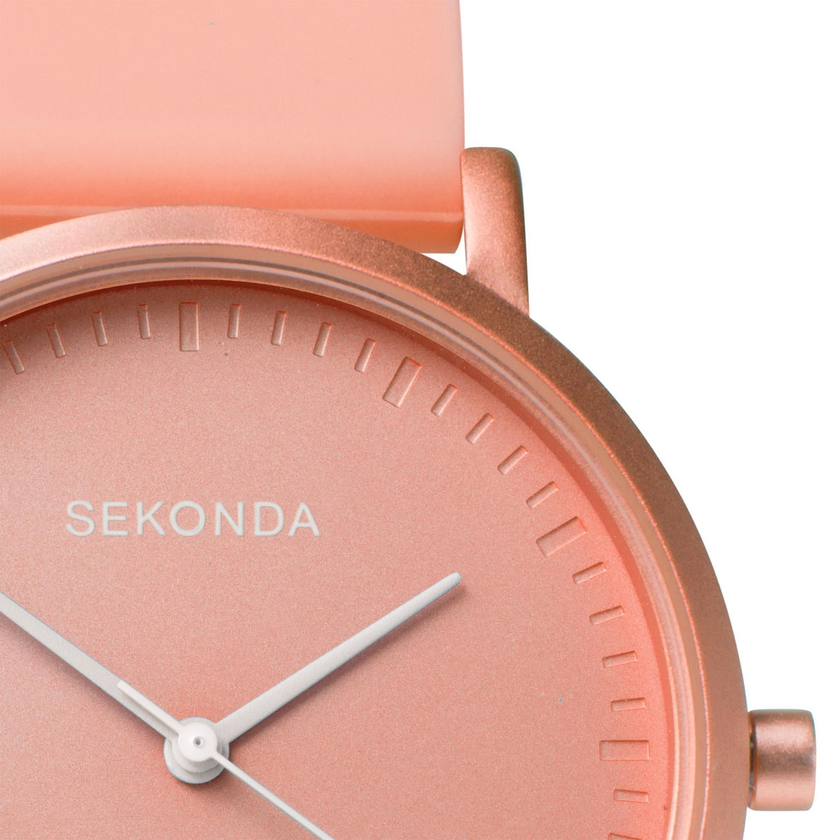 Pink dial ladies watch with SEKONDA branding, silver hands, and pink silicone strap