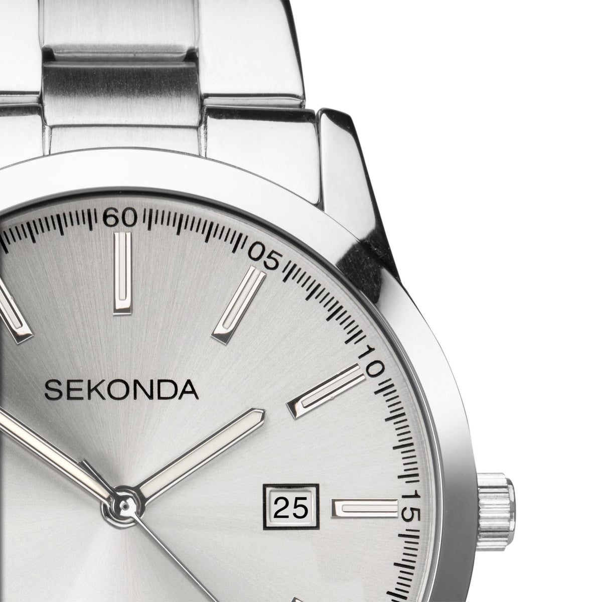 Close-up silver dial stainless watch showing 25 date window and hour markers