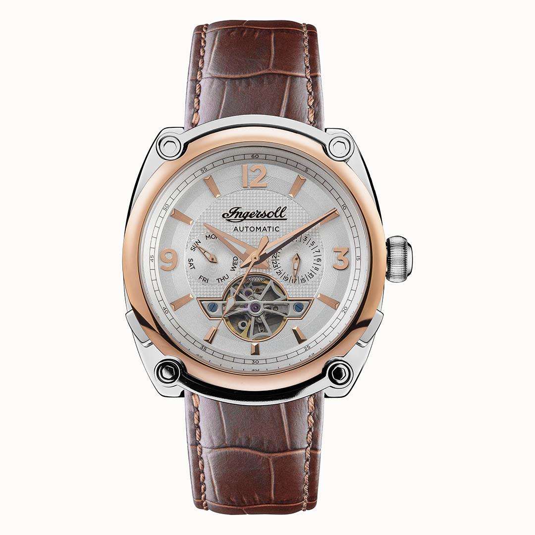 Men's automatic watch front view with white dial, bronze accents, and brown leather strap