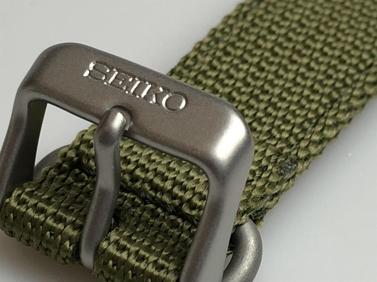 Olive green woven watch strap with SEIKO metal buckle and pin clasp