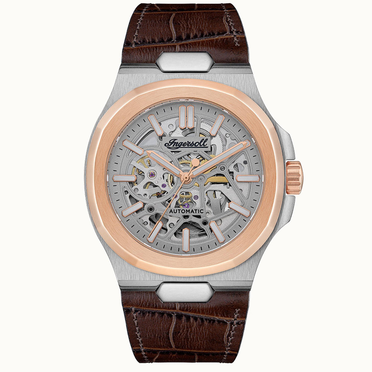 Men's automatic skeleton watch with silver case, rose-gold bezel, and brown leather strap