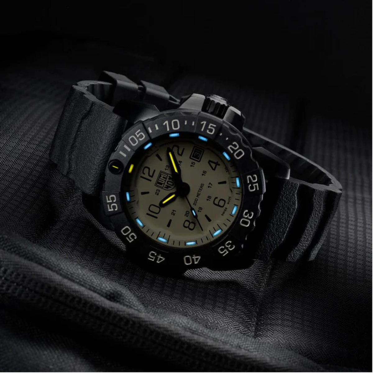 Men's rugged watch with beige dial, black bezel, yellow seconds hand and luminous accents.