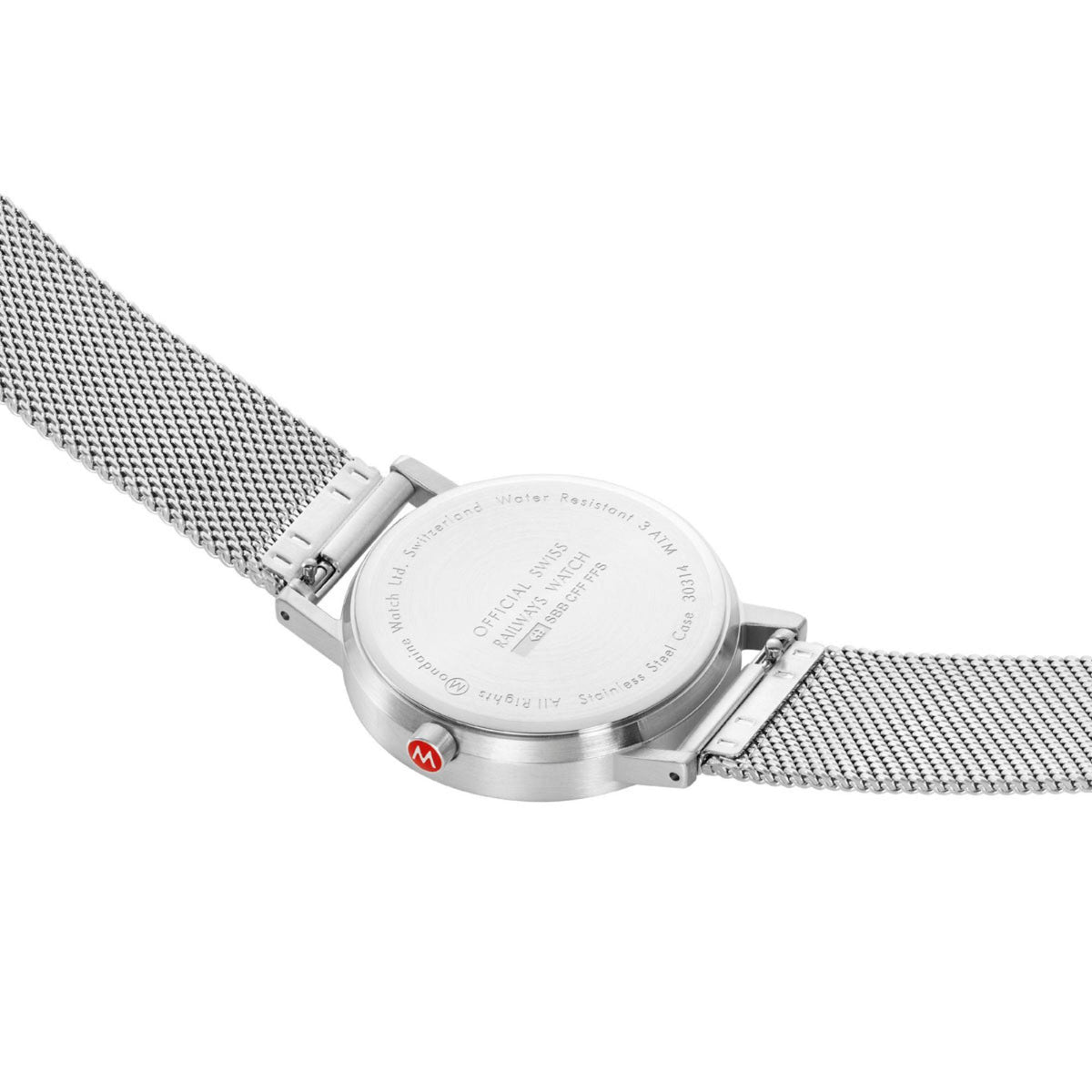 Silver mesh bracelet watch case back with stamped markings and clasp detail